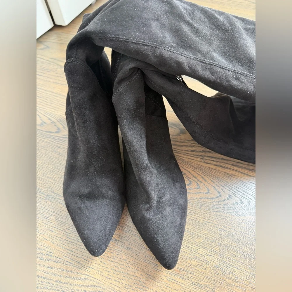 Marc Fisher black faux suede over-the-knee boots with a block heel and tie-back.